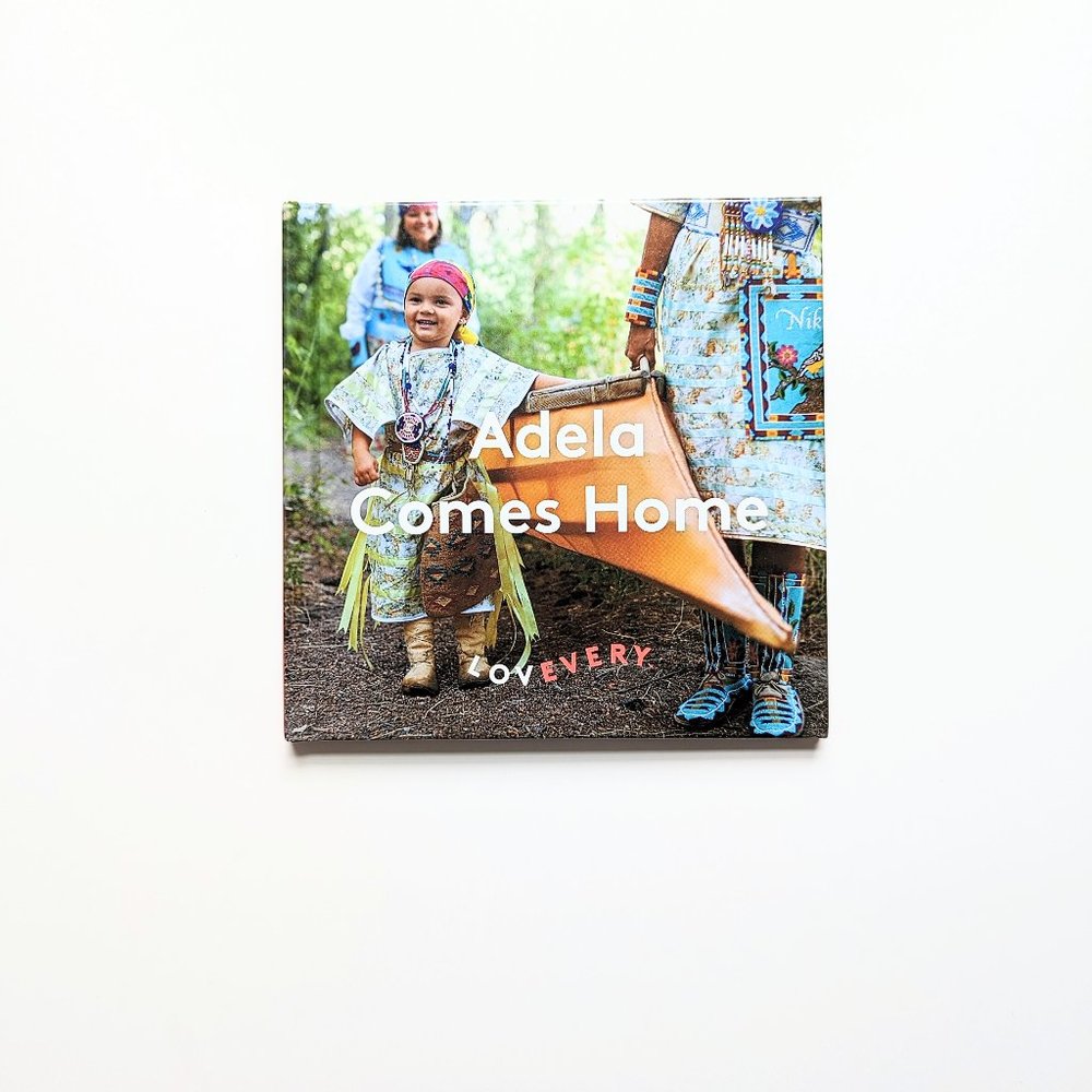 Lovevery - Kids Montessori Board Book - Adela Comes Home